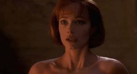 lauren holly nude|Lauren Holly Breasts Scene in Band Of The Hand